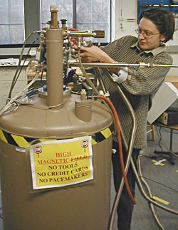 Northwestern graduate Vesna Mitrovic, now an Assistant Professor at Brown University, works with a magnet capable of generating a 3.5-Tesla field.